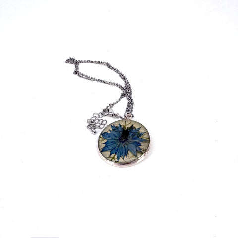 Pressed flower Necklace round silver finish with blue flowers - Arts and Heritage St. Albert